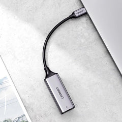 A Photo Of Ugreen CM199 - RJ45 to USB-C Gigabit Ethernet Adapter (1000 Mbps) - External Network Card for Stable Wired Connections