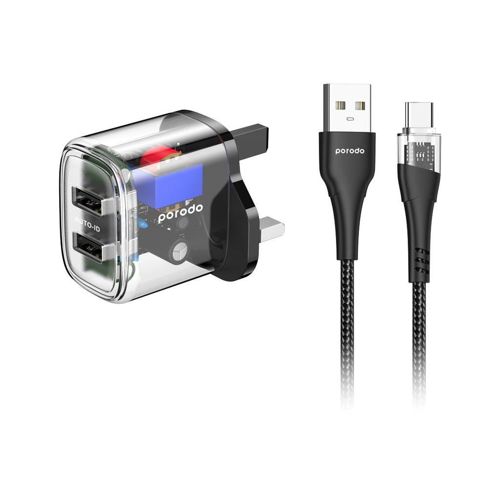 A Photo Of Porodo Dual Output Transparent Charger 2.4A UK with USB-A to USB-C Cable - Black | PD-T12WDAUKC-BK