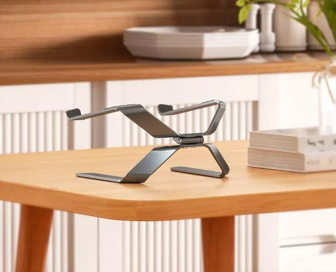 A Photo Of Porodo Alum. alloy 360% Rotatable and Adjustable Laptop Stand - Grey | PD-A150RALS-GY