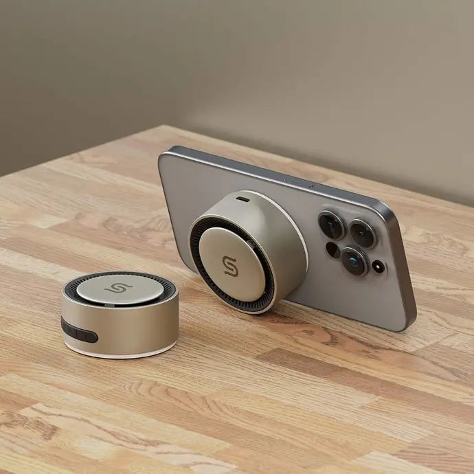 A Photo Of Porodo Soundtec Uniq Magnetic Wireless Charging Bluetooth Speaker | PD-STMWBS-TI