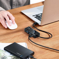 A Photo Of UGREEN USB 3.0 Hub with Gigabit Ethernet Adapter – High-Speed 3-Port USB Hub with 1000Mbps LAN Support